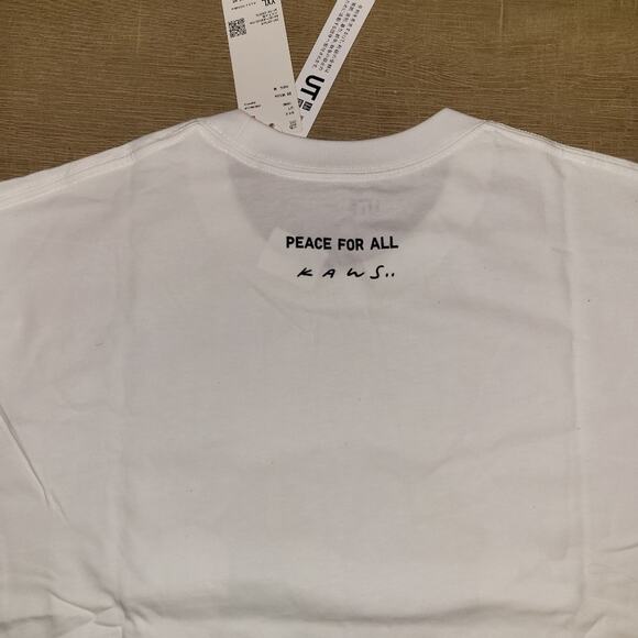 NWT Uniqlo x Kaws World Peace White Short Sleeve Tee Adult Sizes XXL - Picture 3 of 3